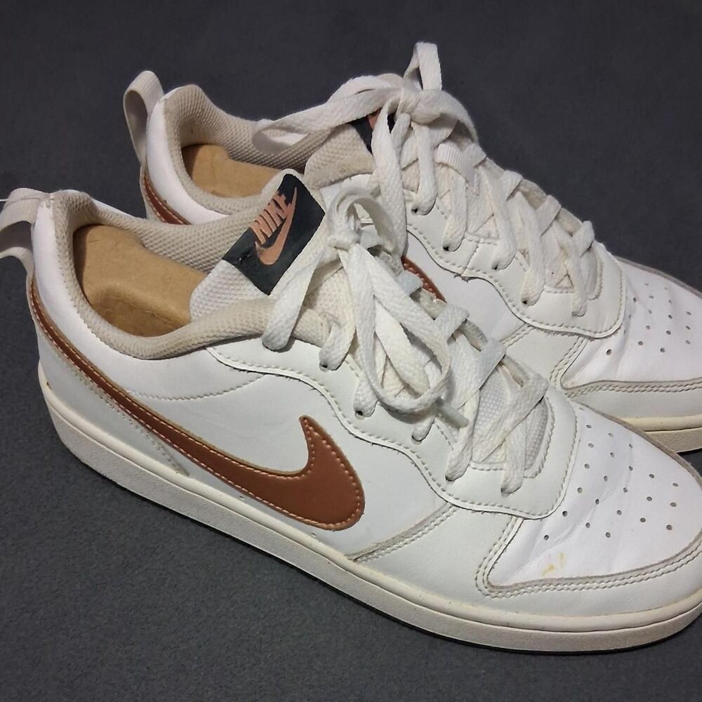 Nike Court borough low womens size 8, youth size 7. White with gold nike symbol